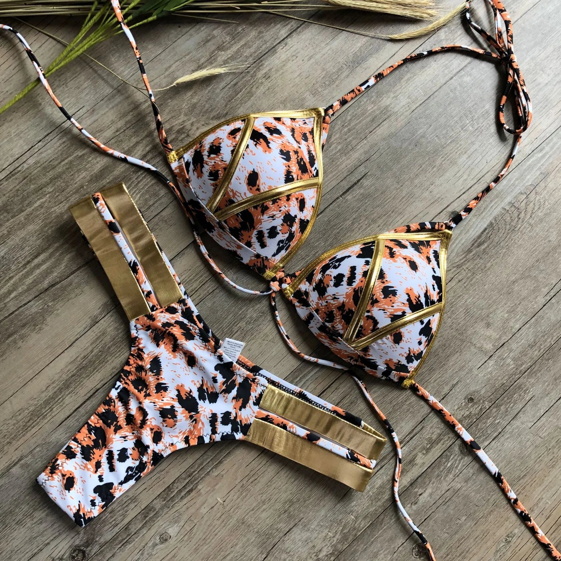 Women's bronzing bikini swimwear in multiple colours and prints for swimming.