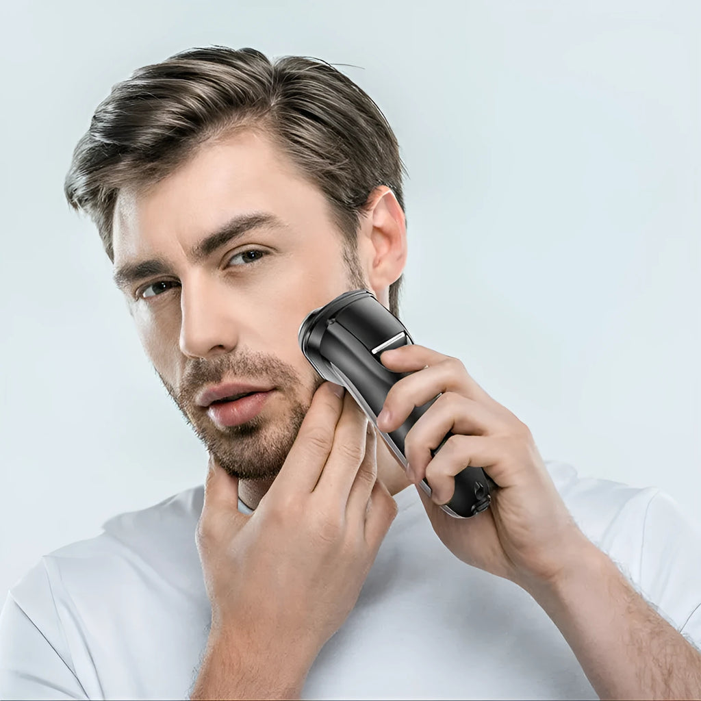 Men's electric shaver with three floating heads, pop-up sideburn trimmer, USB cable, and cleaning brush