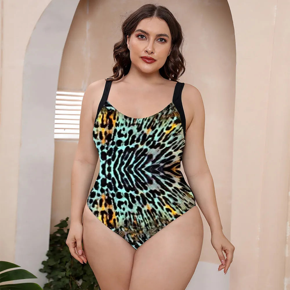 Floral print one-piece swimsuit with spaghetti straps and a conservative vest-style top.