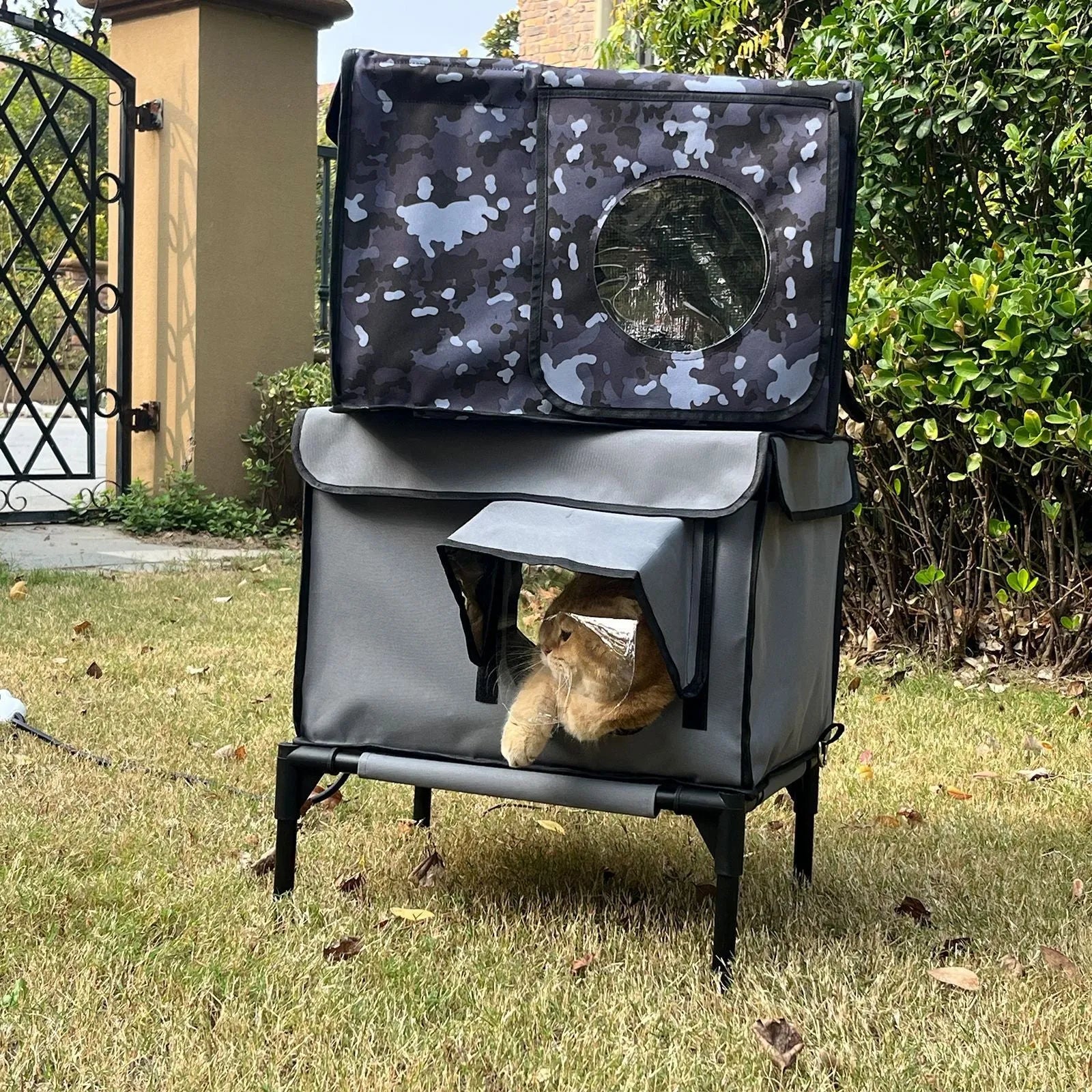 Outdoor heating insulation foldable cat nest with thermo sensitive switch in black, size M, on a floor