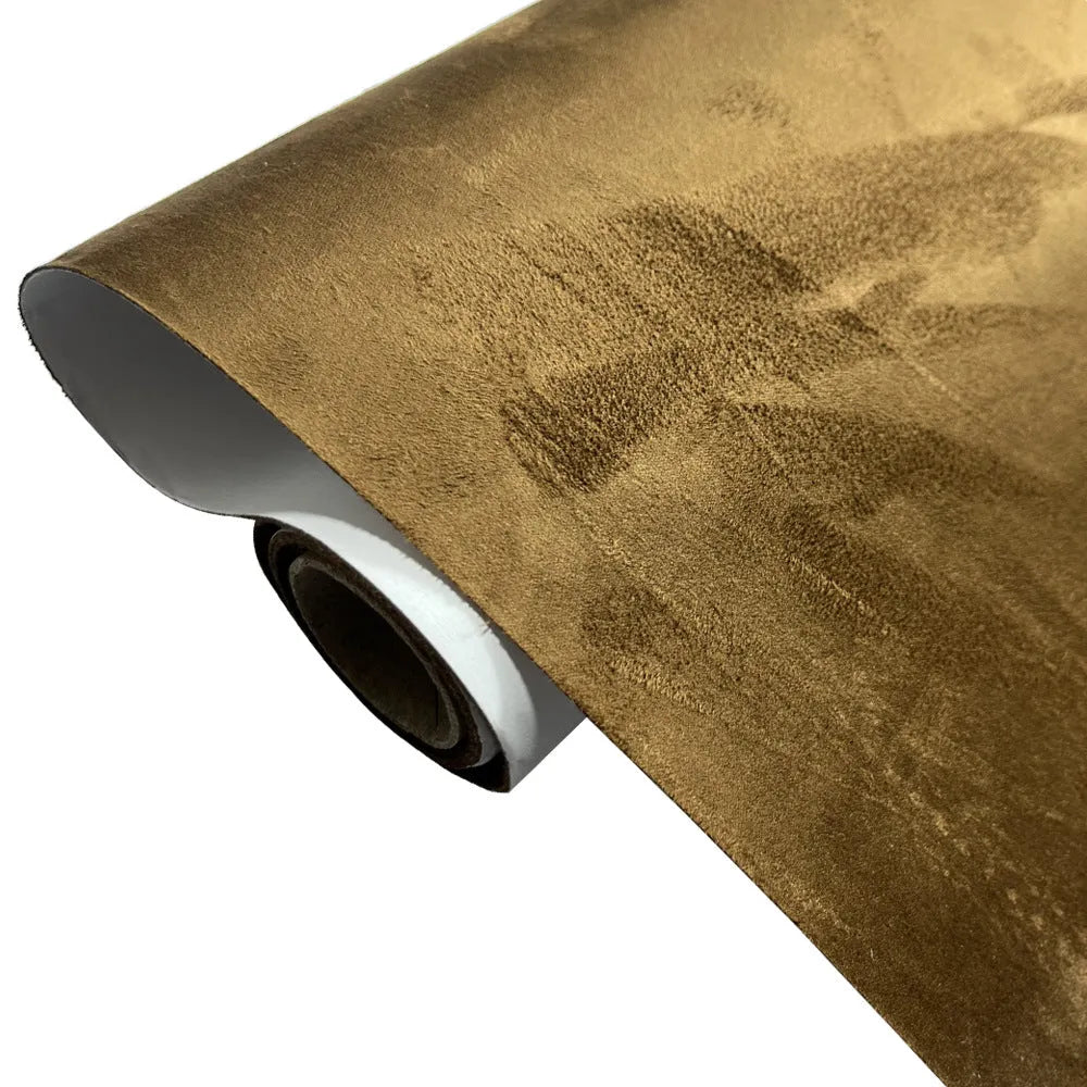 Rolls and sheets of coloured self-adhesive suede leather material for DIY projects.