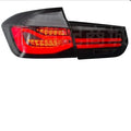 BMW 3 Series modified tail light assembly with streamer steering LED lights in red finish