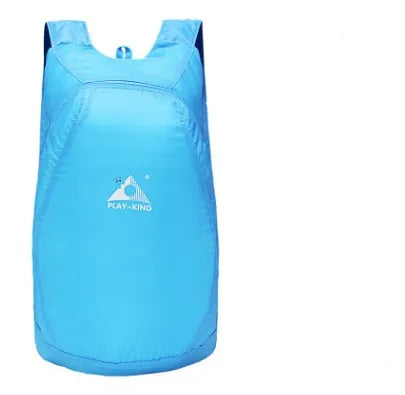 Ultra-thin foldable 20L waterproof polyester backpack in sky blue, folded to fist size
