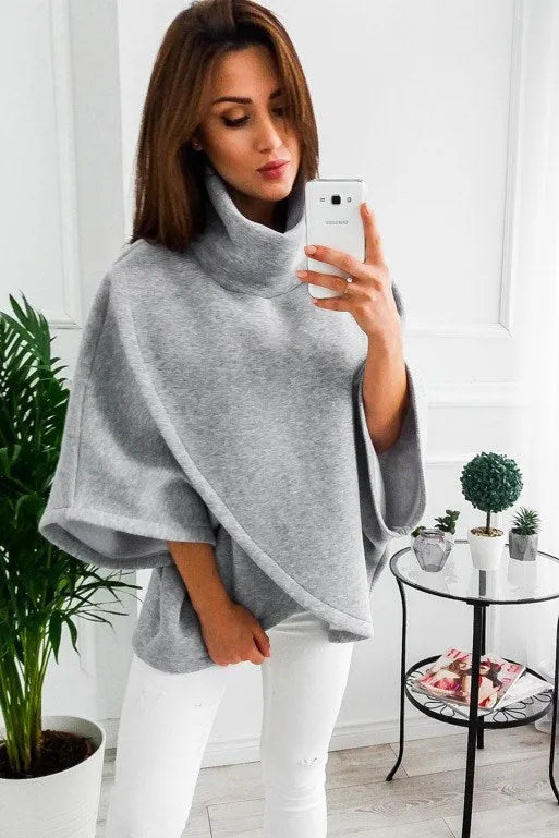 Women's longline bat-sleeve cardigan sweatshirt in grey with three-button placket and stitching detail.