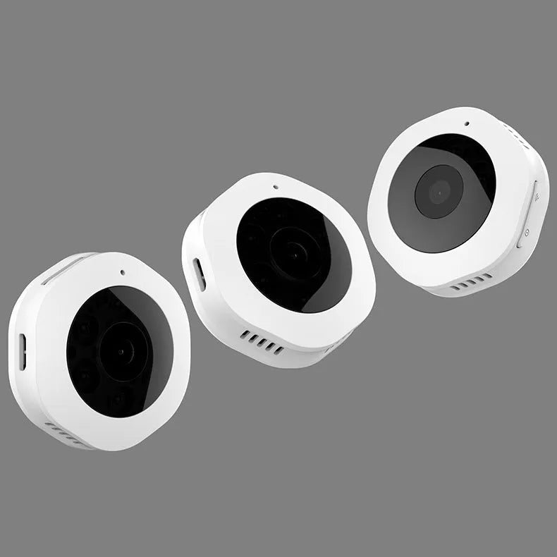 Mini round 1080P body camera with motion detection and Micro SD support, shown on a surface with magnetic pad