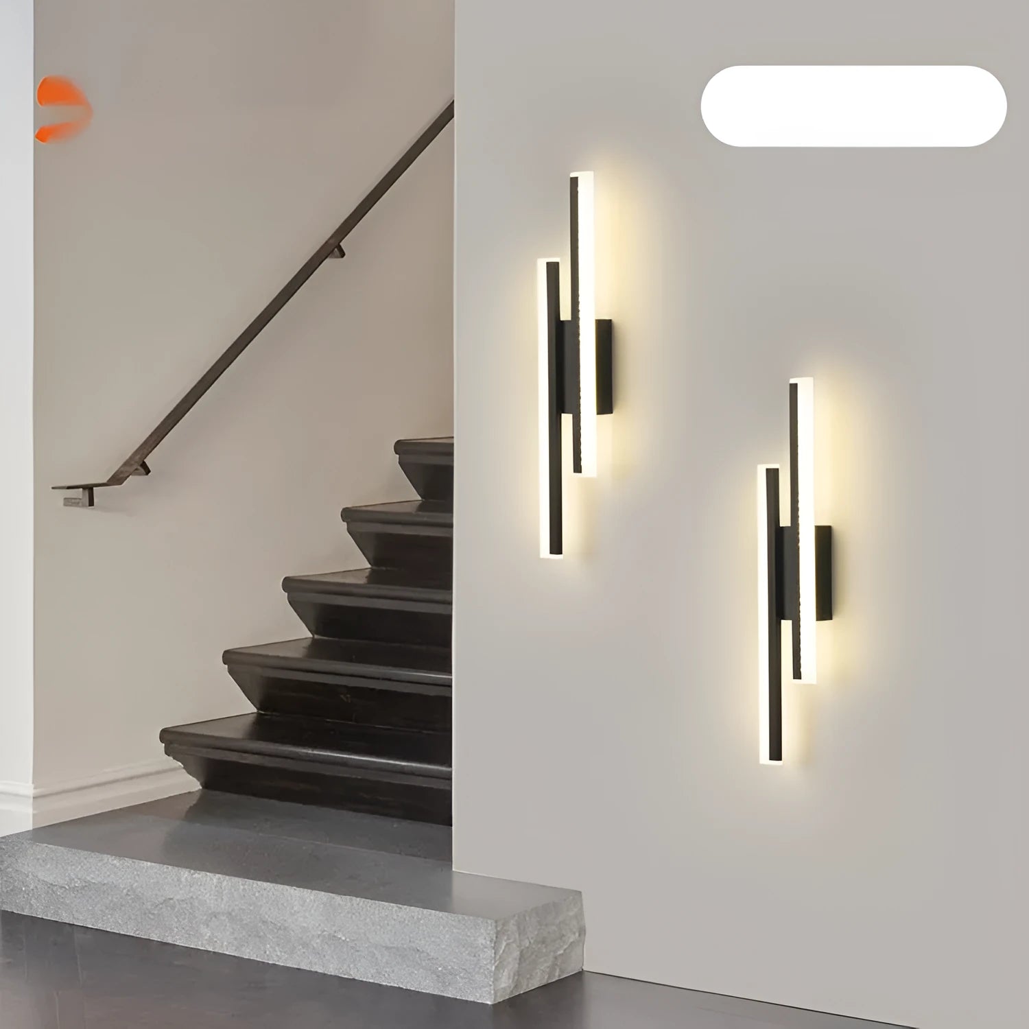 Modern gold double line wall lamp mounted on a wall, showing its 500mm length and artistic design for background lighting.