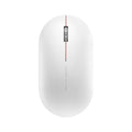 Ultra-thin grey wireless mouse with touch wheel and two buttons on plain background