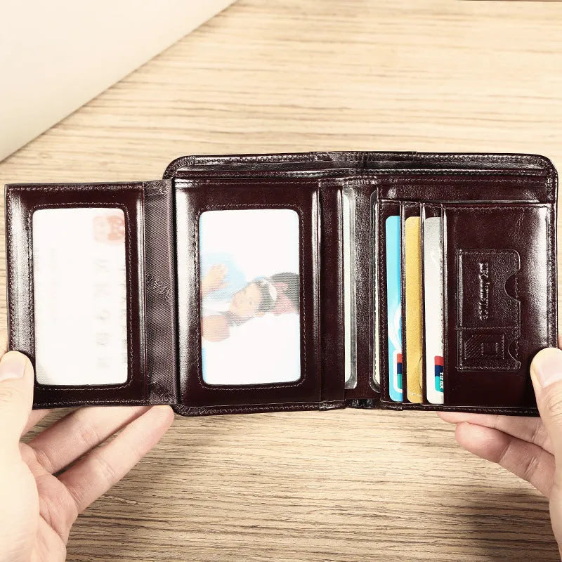 Men's leather wallet showing internal compartments for banknotes, cards, coins, and documents