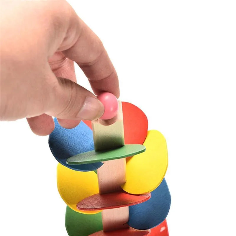 Wooden children's educational tree model with coloured chips and a small ball on top, 21cm tall