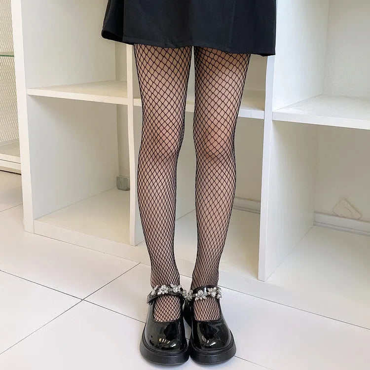Women's summer mesh stockings showing large, medium and small net patterns in black and white colours