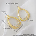 Yellow gold geometric drop earrings with oval shape measuring 2.6 by 1.7 centimetres