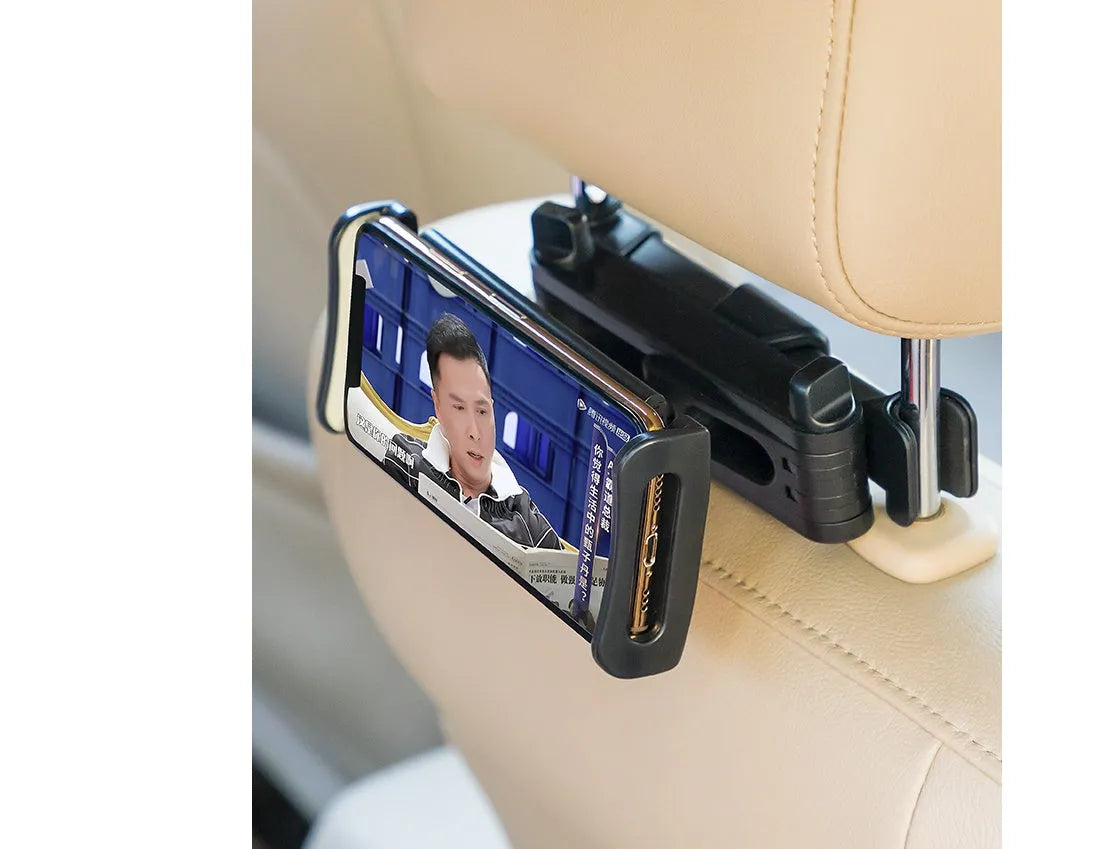 Black universal car phone and tablet holder with adjustable clamp mounted on vehicle rear seat
