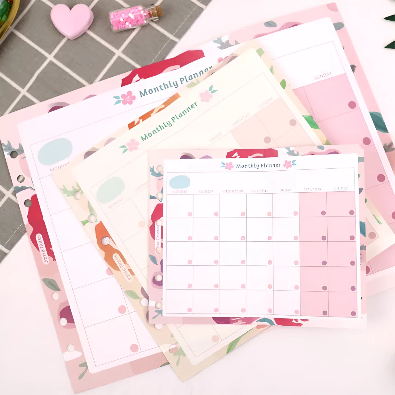 A5, A6, and A7 loose-leaf planner refill sheets showing floral and tri-fold layout designs