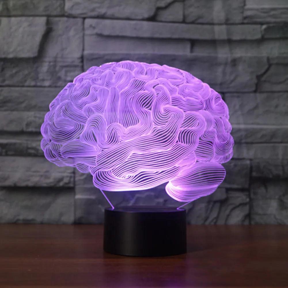 3D acrylic LED desk lamp showing colourful light projection with remote control on a wooden table.