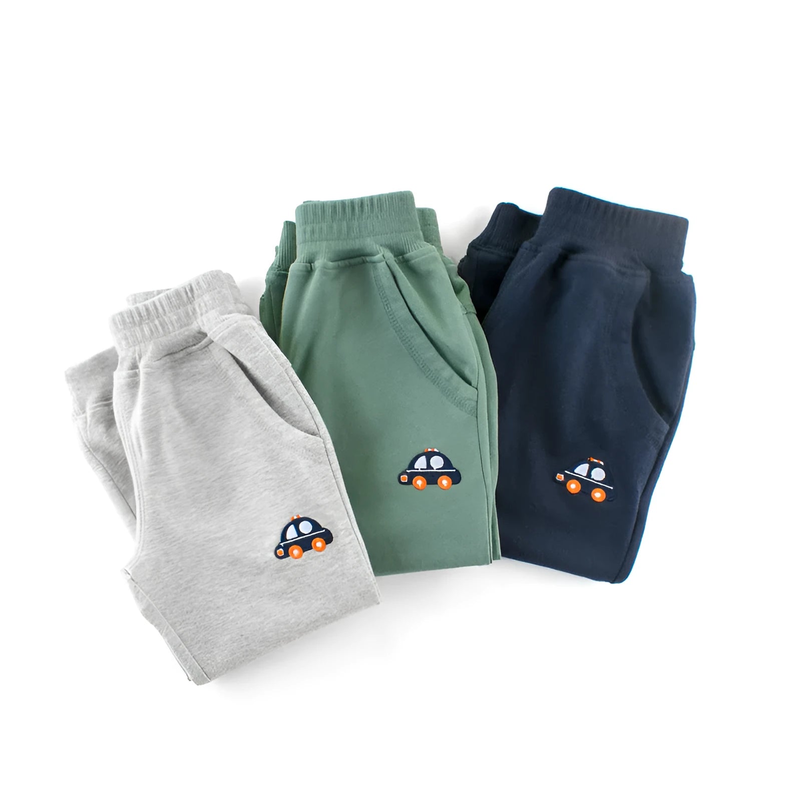Boys Korean style sports sweatpants with cartoon pattern, soft treated fabric, available in blue green grey navy blue