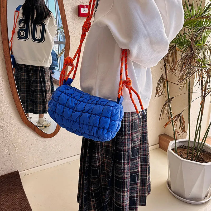 Women's lightweight nylon messenger bag in pillow shape with crossbody strap and rhombus pattern