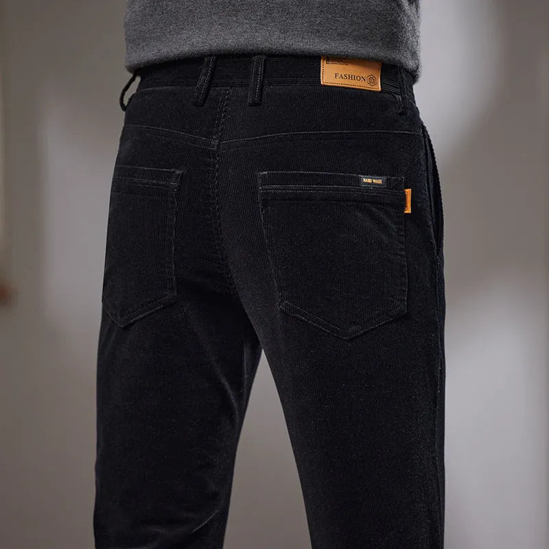 Slim fit straight corduroy trousers in dark gray, cotton fabric, mid waist with micro elasticity.