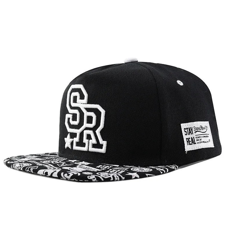 Cotton baseball cap with embroidered letters showing dome crown and adjustable back strap