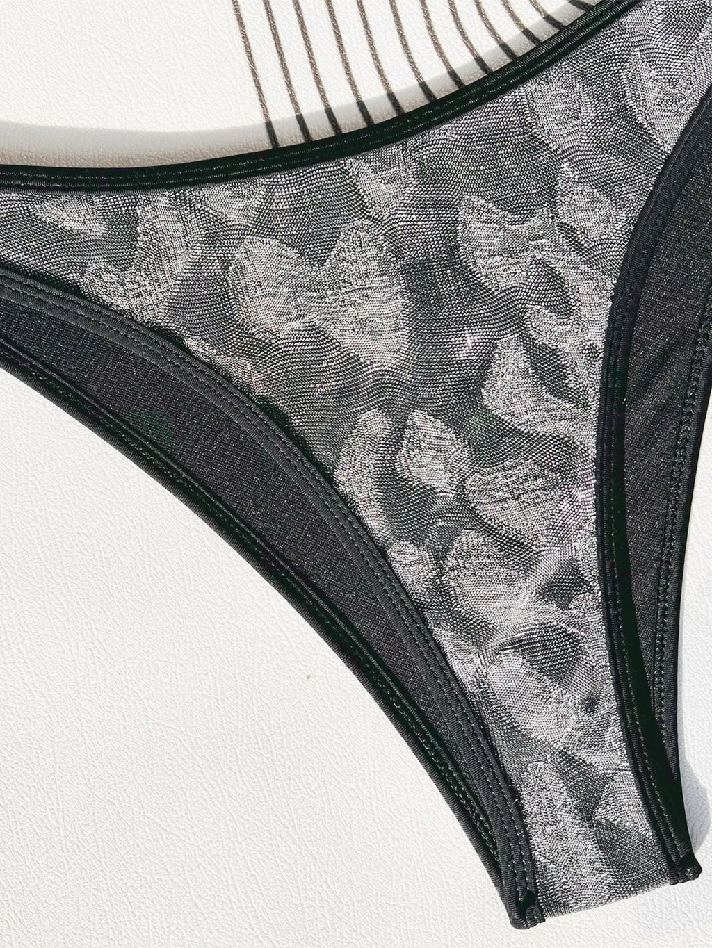 Black strappy bikini swimsuit set for women in polyester fabric