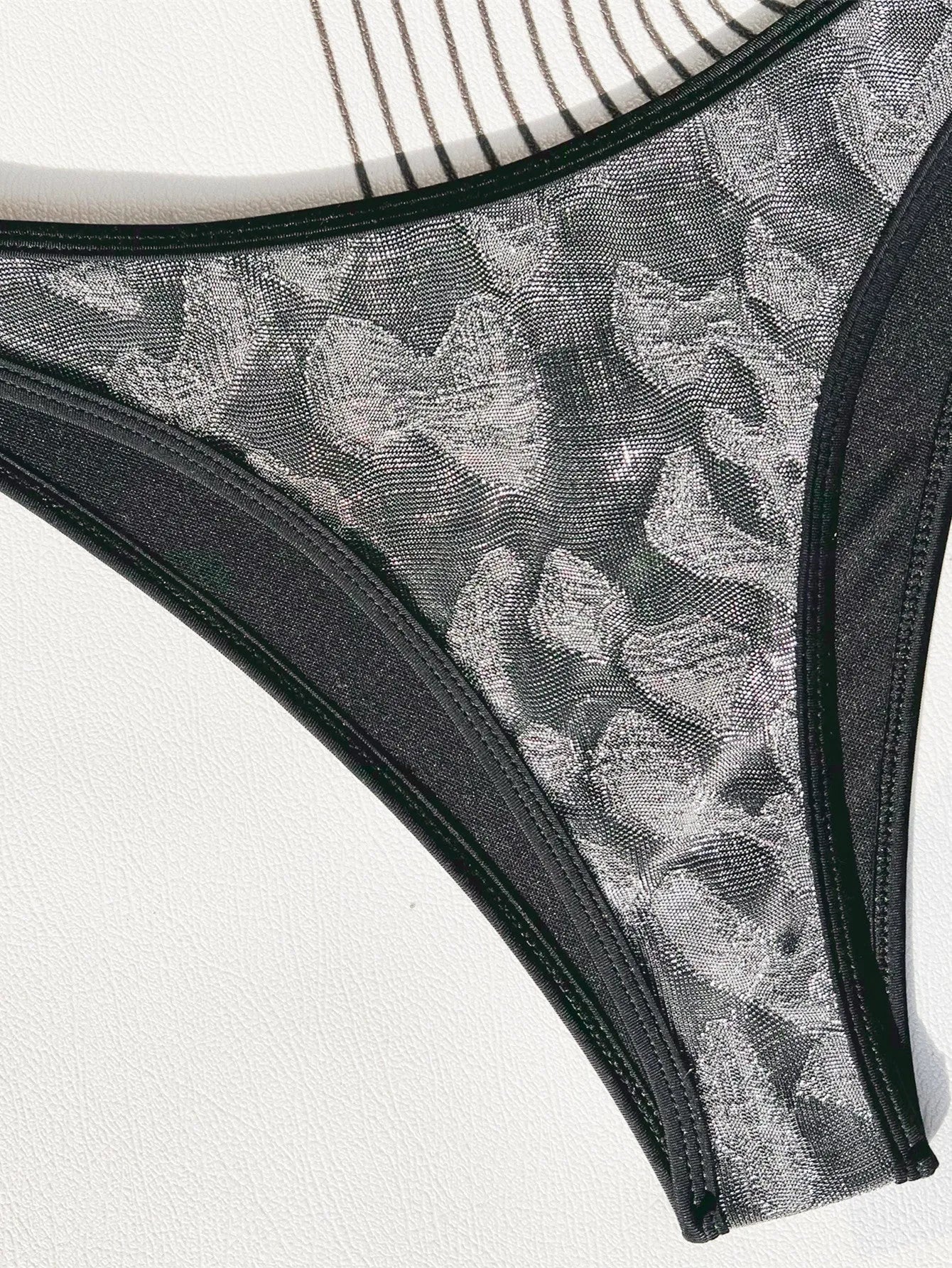 Black strappy bikini swimsuit set for women in polyester fabric