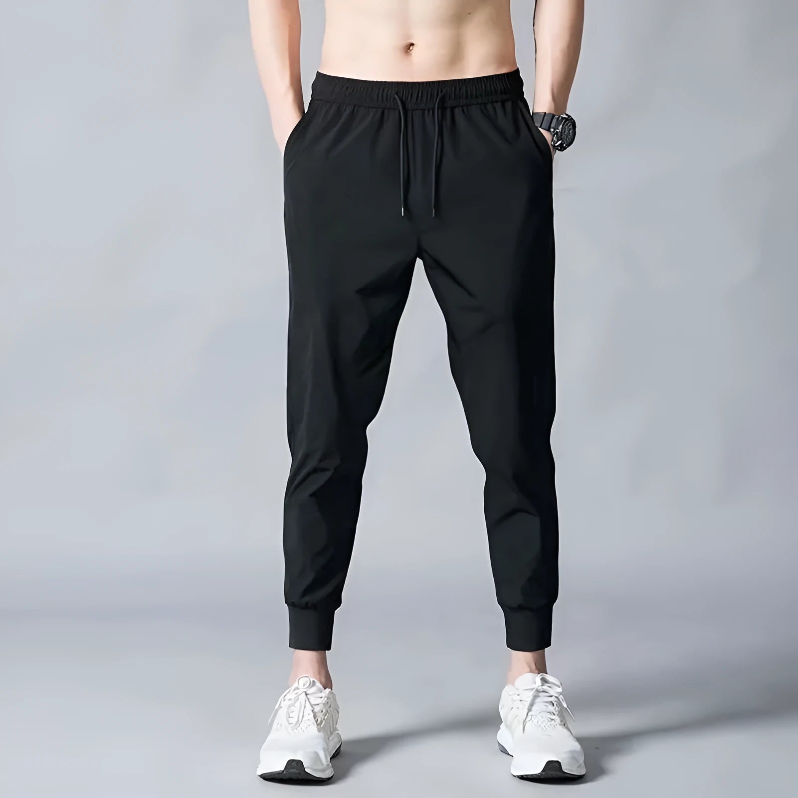 Men's loose fit thin ice silk polyester trousers in black leg style for autumn casual wear