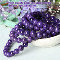 Natural transparent charoite crystal bracelet with platinum clasp, showing different bead size options.