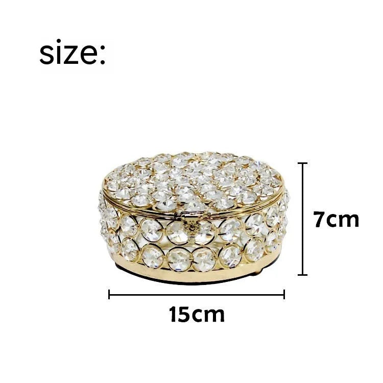 Transparent crystal glass jewellery storage box with French gold metal finish in a European style.