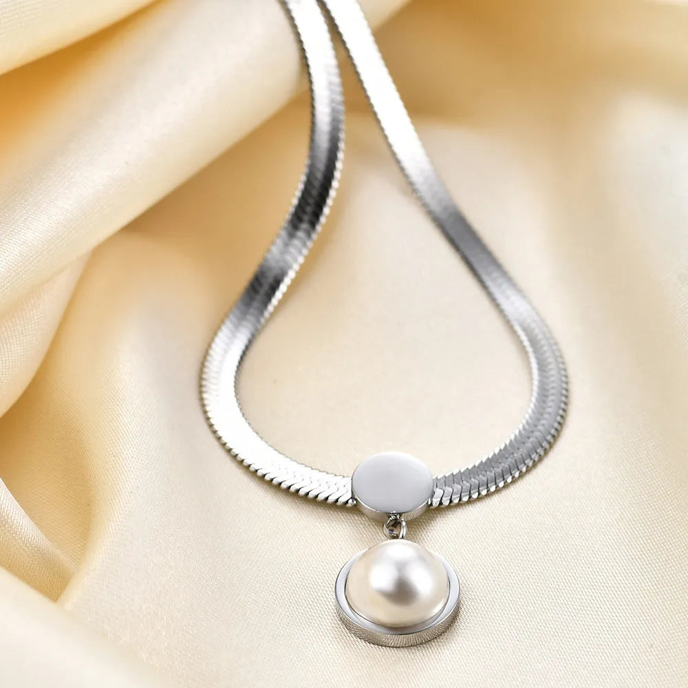 8mm flat snake blade necklace in titanium steel with geometric round element, available in steel colour