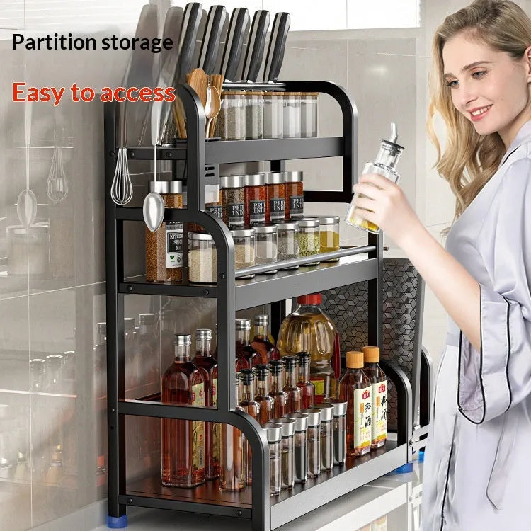 Modern no-drill carbon steel floor storage rack with knife holder and six hooks for kitchen organisation.