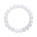 White Hetian jade barrel bead bracelet shown in three bead size variations on a wrist.