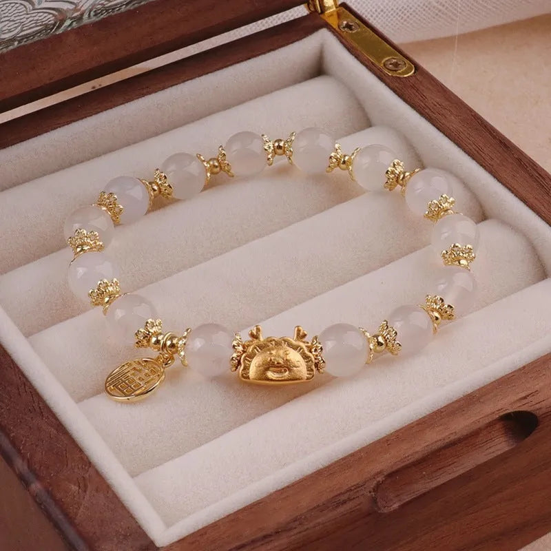 Women's floral glazed zodiac animal bracelet with colourful glass beads and electroplated metal details
