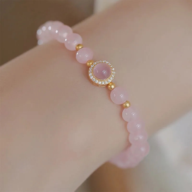Women's aquamarine crystal bracelet with pink and blue dopamine colours, round geometric beads, handcrafted mixed materials