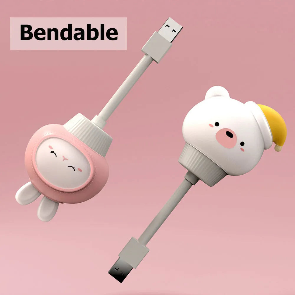 Cartoon animal USB night light with adjustable brightness on bedside table