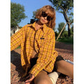 Dopamine yellow plaid shirt with loose cardigan style on hanger
