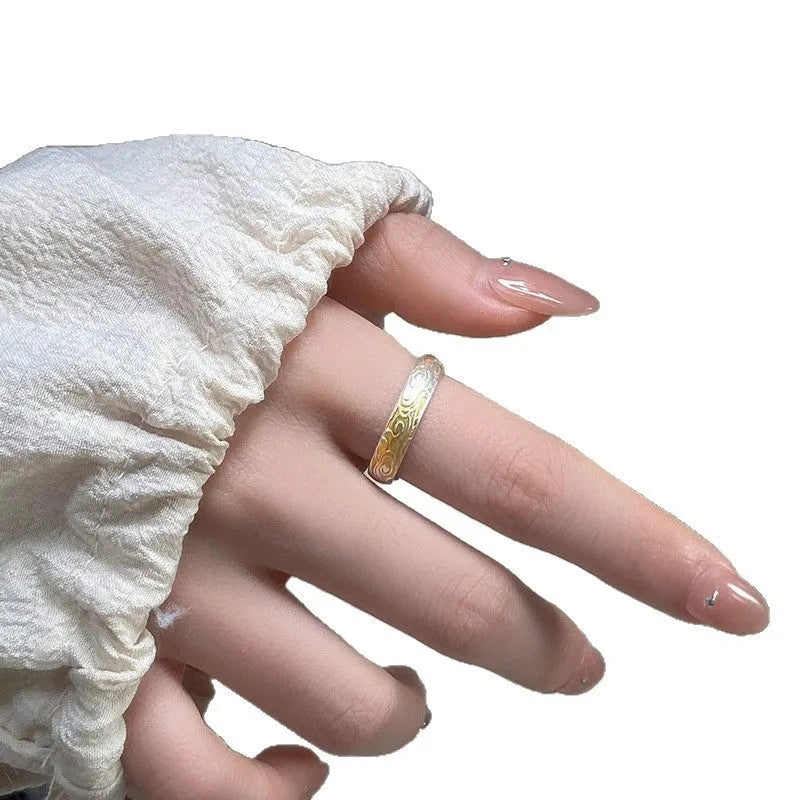 Geometric open mouth ring with Xiangyun pattern in electroplated silver and gold finish on white copper