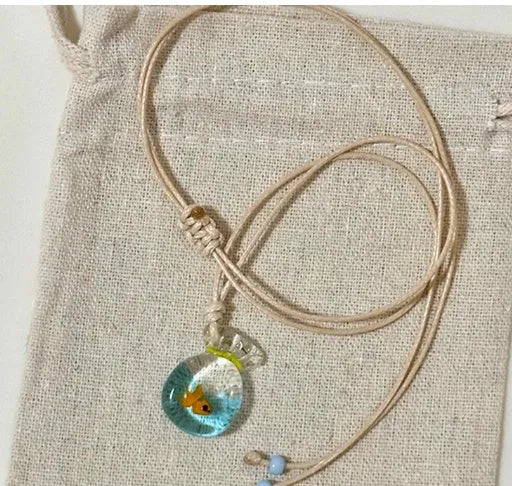 Women's necklace with coloured glaze joker skirt pendant on a cotton linen clavicle chain
