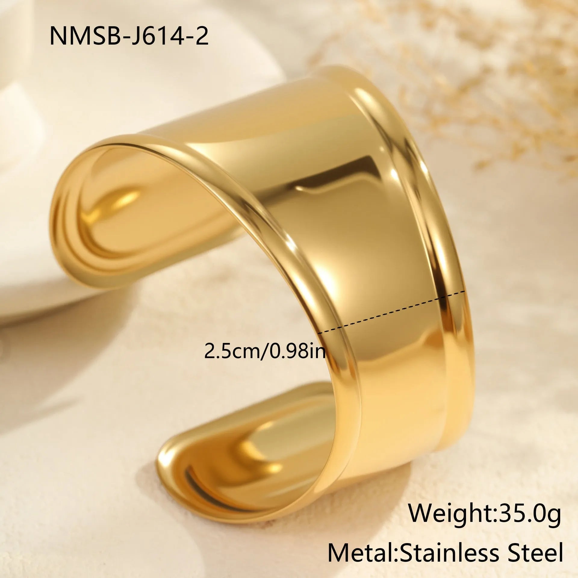 Women's gold-plated wide bracelet with stainless steel construction and geometric design