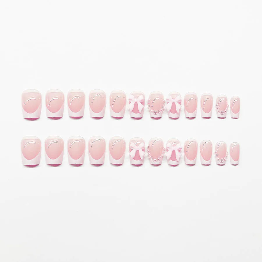 Short French manicure nail art set with tulip patterns and bow designs