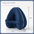 Heart-shaped memory foam leg pillow in blue colour showing dimensions of 25x23x13 cm