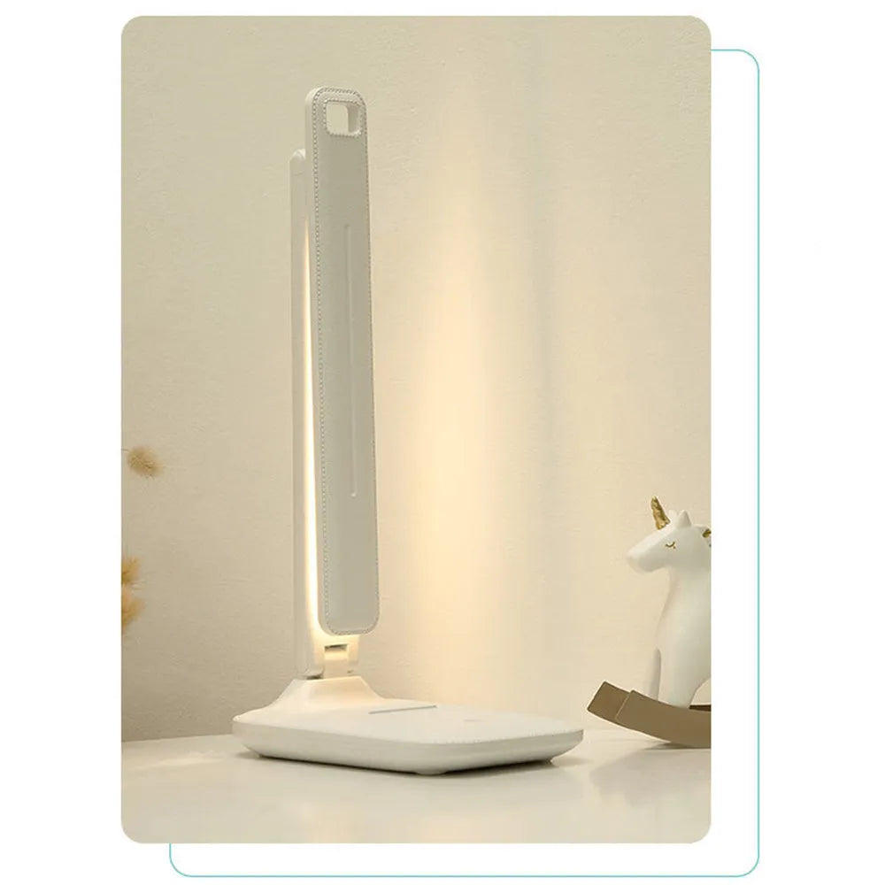 White children's bedside lamp with touch dimming controls and USB charging port