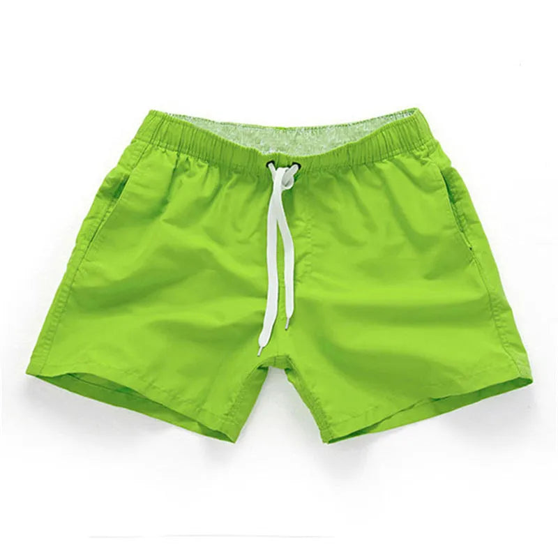 Men's straight leg polyester board shorts on a hanger, available in multiple colours and plus sizes.