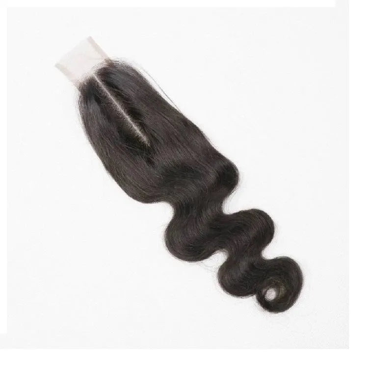 Straight natural colour human hair wig for women shown at medium length.
