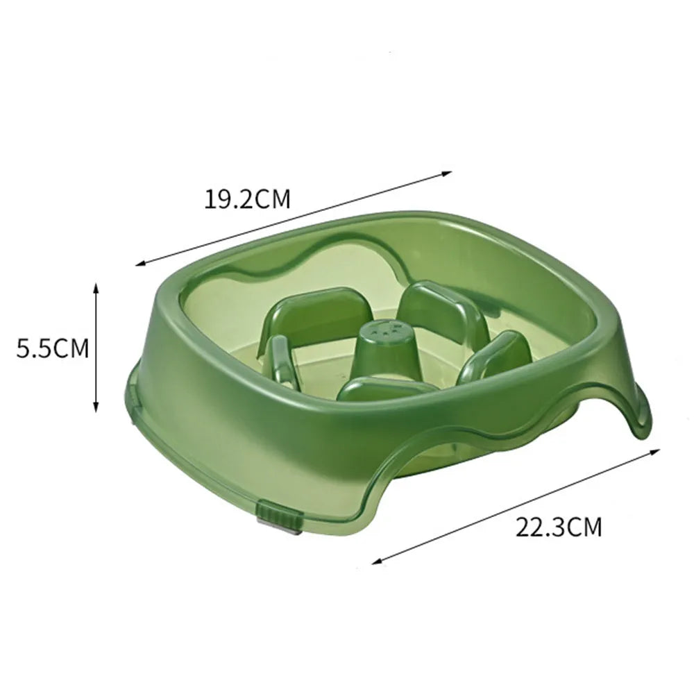 Blue plastic slow feeder dog bowl for anti-choking feeding on a plain surface.