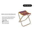 Black aluminium alloy folding camping stool in train-style design for outdoor use