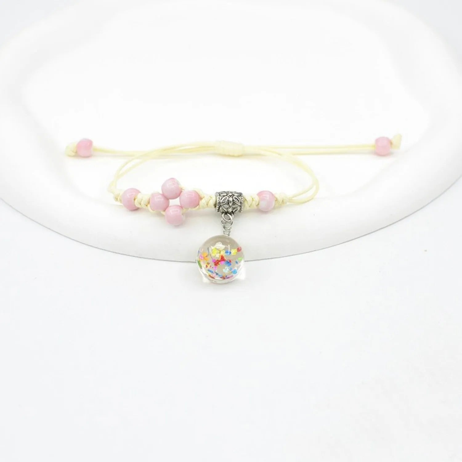 Women's hand-woven glass dried flower bracelet with large 1.4 cm beads in multiple colour options.
