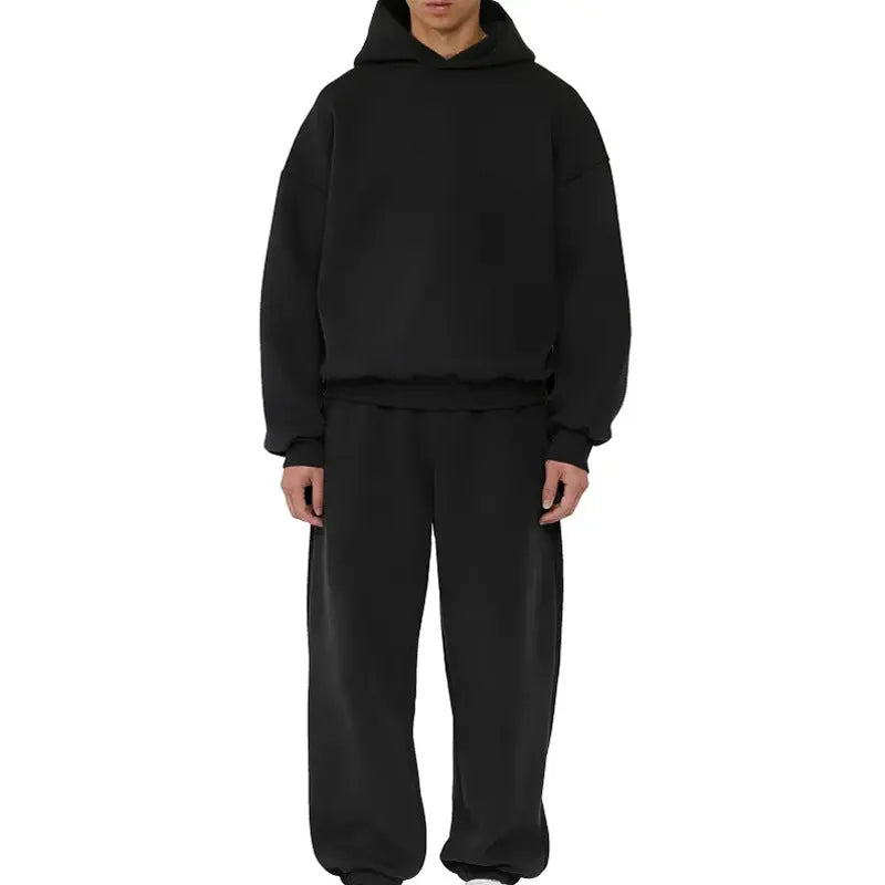 Man wearing a solid colour fleece-lined cotton hoodie sweater with a wool lining.