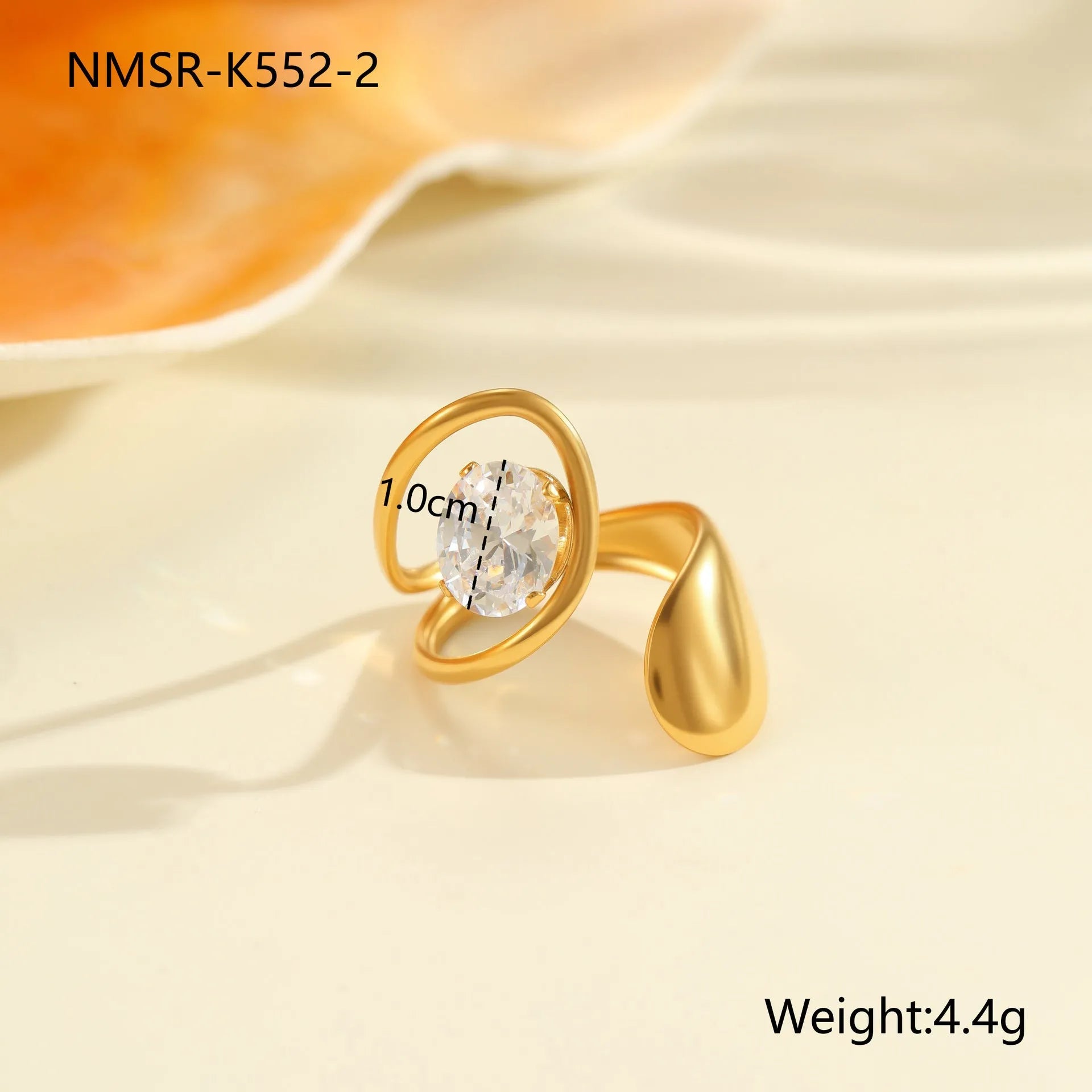 Adjustable geometric stainless steel ring showing open mouth design and colour variations