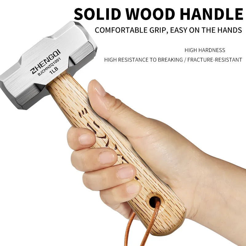 Mini claw hammer with wooden handle and high carbon steel head on a workbench