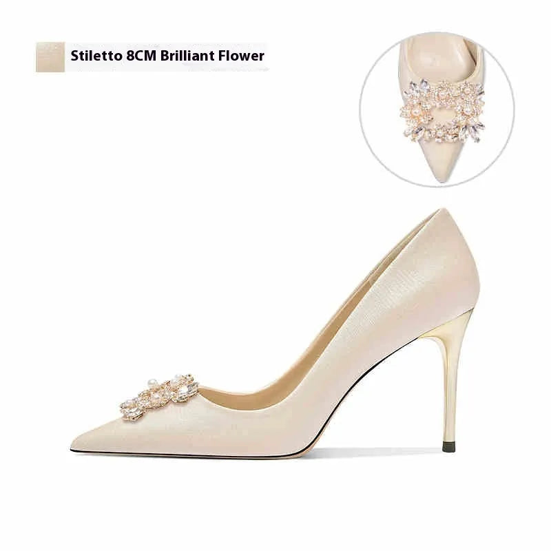 Crystal-embellished bridal high heels with pointed toe, available in stiletto or cat heel styles.