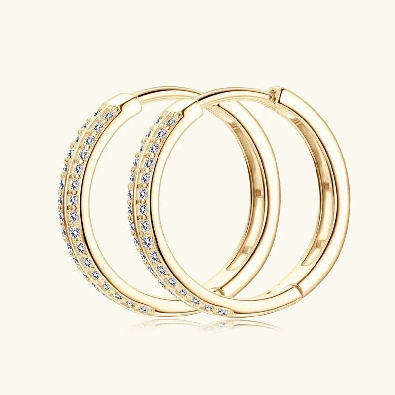 Geometric moissanite earrings with 0.16 karat stone, tassel, and double ring details in gold finish